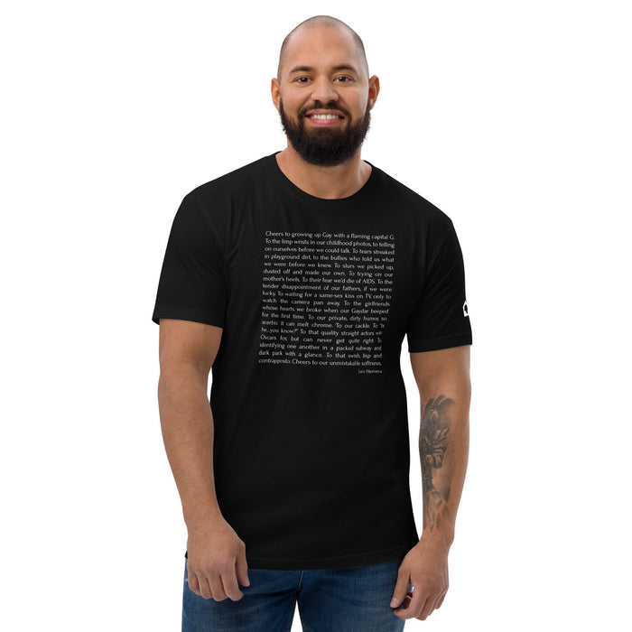 Male model wearing black fitted Leo Herrera Cheers to Growing Up Gay t-shirt, front view, Adam's Nest x Leo Herrera collaboration Provincetown