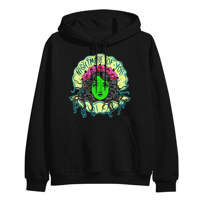 Nightmare Of You black hoodie with a vivid graphic of a green-faced woman, pink flowers, and blue tentacles, framed by "Nightmare Of You" in yellow. Made with premium Independent Trading Company pullover for standout style.
