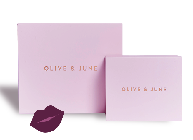 Gift Box with Olive and June branding in soft pink packaging for an at home manicure and pedicure set