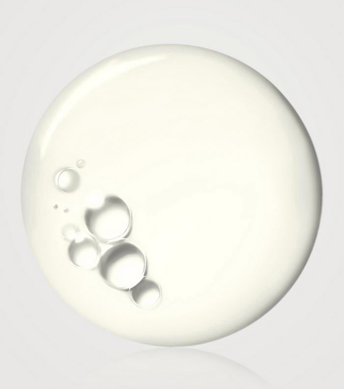 La Mer The Balancing Treatment Lotion 50ml in a clear glass bottle with a white cap, showcasing the skincare product.
