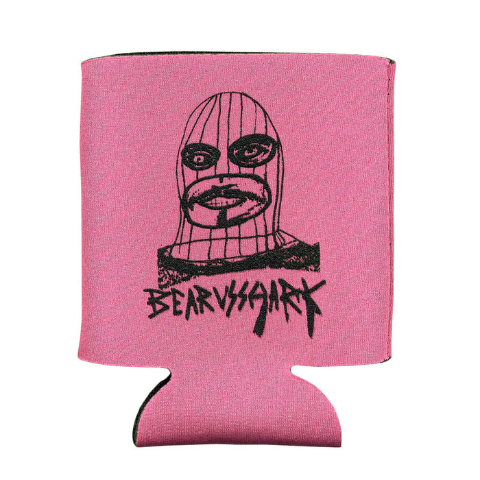 A bearvsshark Masked Pink Koozy featuring a black line drawing of a masked face with bold eyes and lips, plus the stylized bearvsshark text below the illustration.