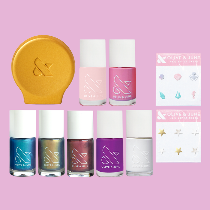 Mini Favorites Set with seven mini nail polishes, two sheets of nail art stickers, and limited edition gold Poppy mani kit
