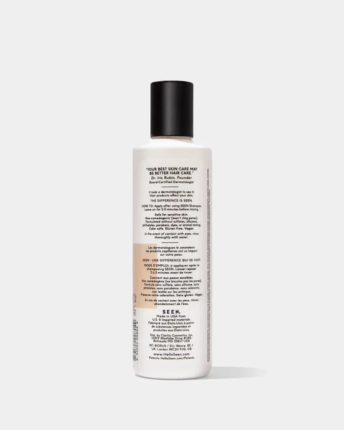 SEEN conditioner bottle, 8.6oz, with scented label, showing the sleek packaging and product details for hair care.