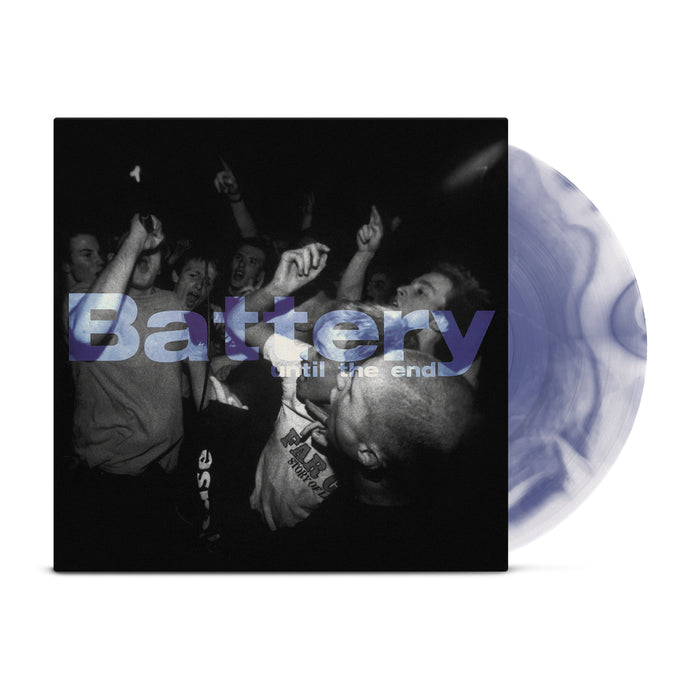 Purple and white swirl vinyl peeks out of a black and white jacket with an image of a performer with a mic in front of multiple men partying. Purple letters in the center say, "Battery: until the end".
