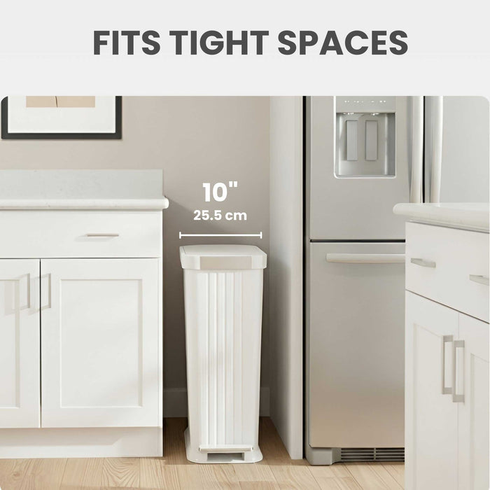 iTouchless PE13WW slim step trash can fits into tight spots like between refrigerator and counter in the kitchen