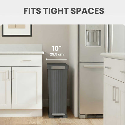 iTouchless PE13GG slim step trash can fits into tight spots like between refrigerator and counter in the kitchen