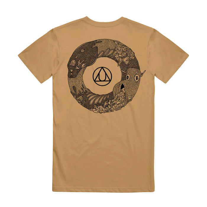 A golden colored shirt has a black and white ouroboros on the back of the shirt.