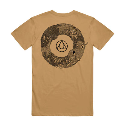 A golden colored shirt has a black and white ouroboros on the back of the shirt.