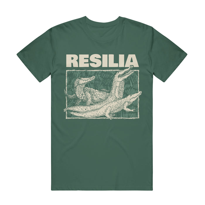 Resilia green T-shirt with "RESILIA" in bold beige letters above a beige sketch of three alligators, inspired by Royal Pine, framed in a rectangular border.