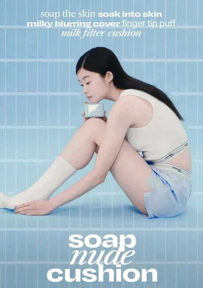 Person sitting on a tiled floor with text about a product labeled 'soap nude cushion'.