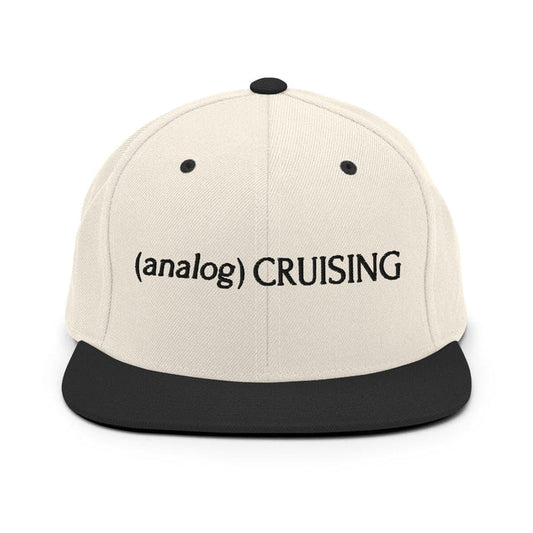 Leo Herrera (analog) CRUISING YP classic flatbill snapback in natural/black with black embroidery, front view on white background