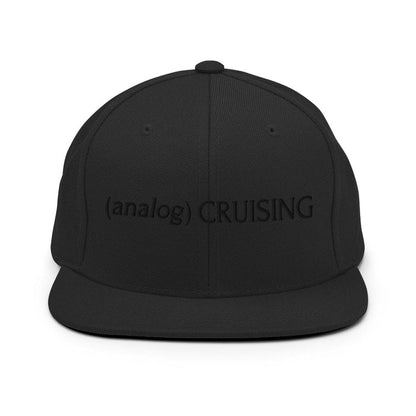 Leo Herrera (analog) CRUISING YP classic flatbill snapback in black with black embroidery, front view on white background