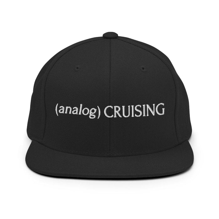 Leo Herrera (analog) CRUISING YP classic flatbill snapback in black with white embroidery, front view on white background