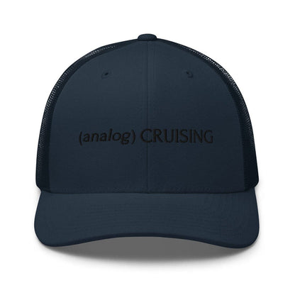 Leo Herrera (analog) CRUISING retro trucker hat in navy with black embroidery, front view on white background