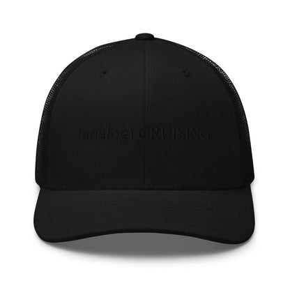 Leo Herrera (analog) CRUISING retro trucker hat in black with black embroidery, front view on white background