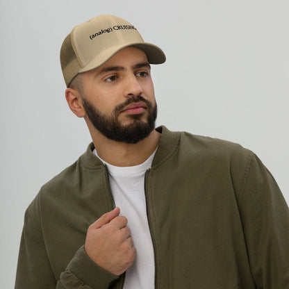 Leo Herrera (analog) CRUISING retro trucker hat in khaki with black embroidery, worn by model