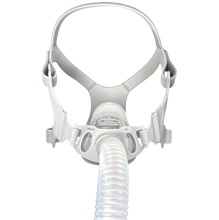CPAP mask with hose on a white background