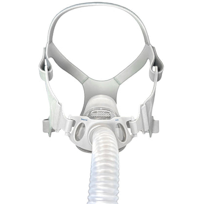 CPAP mask with hose on a white background