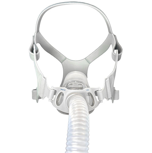 CPAP mask with hose on a white background