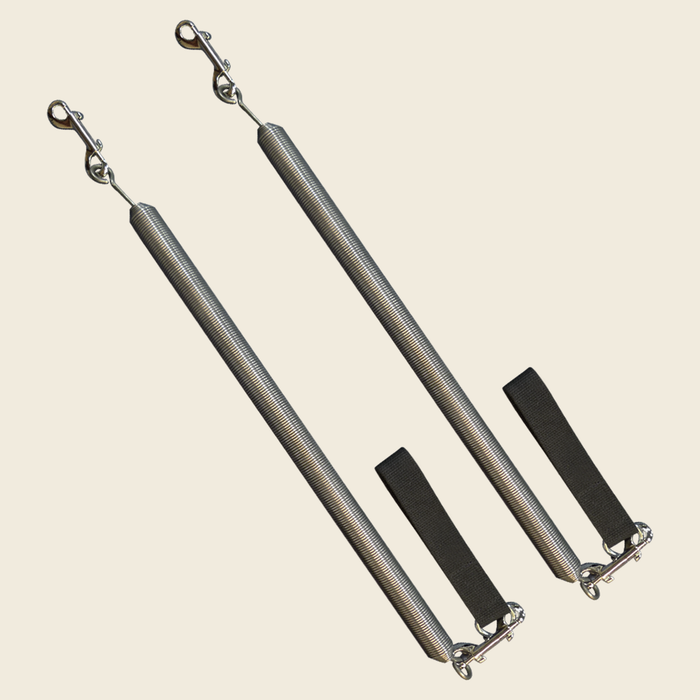 Pair of Gratz Pilates arm springs with black loop straps and double hooks assembly.