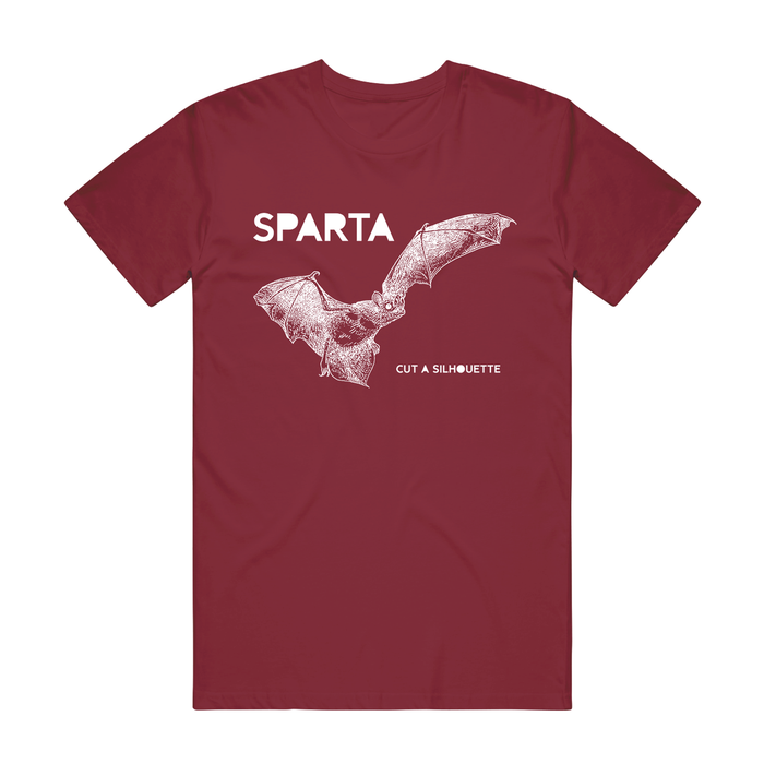 The Sparta Maroon Comfort Colors T-Shirt is made from soft, ring-spun cotton and showcases a white bat line drawing in flight, with “SPARTA” above and “CUT A SILHOUETTE” in small text below for a unique look.