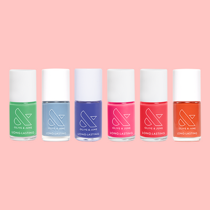 Best of Summer Set with six vibrant, long-lasting nail polish bottles in bright summer shades on pink background