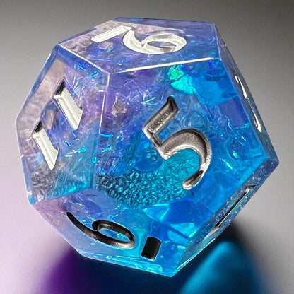 7-piece Blue and Purple Prismatic Dice Set with swirling resin and white numbering, designed for DnD and fantasy RPGs.