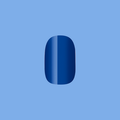 Single deep denim blue nail in short squoval shape from Bootcut | Short | Squoval - Tab Press-On set