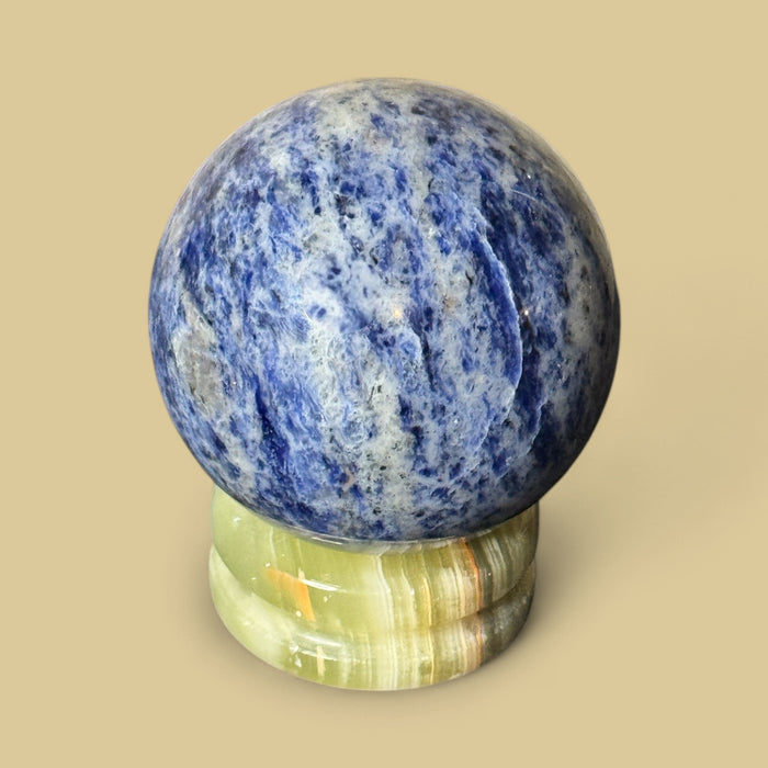 Brazilian Sodalite sphere 440g polished crystal for meditation and intuition - Raven's Cauldron 6 N Sandusky St. Delaware, OH 43015