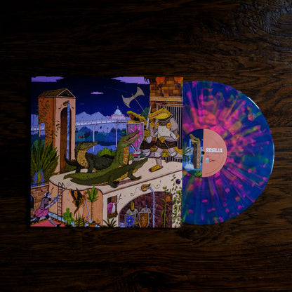 A limited edition Resilia vinyl with pink, blue, and yellow swirls is partly inside an illustrated album cover showing two armored animals facing a green dragon. The vinyl label features the Resilia brand name.