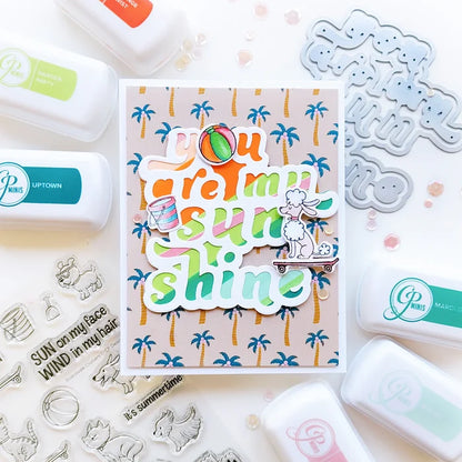 Catherine Pooler - Layered Word Dies - My Sunshine. This word die cuts a frame for the phrase "you are my sunshine" that can be used open or with the letters inlaid back inside for more color contrast. Available at Embellish Away located in Bowmanville Ontario Canada. Example by Catherine Pooler Designs.