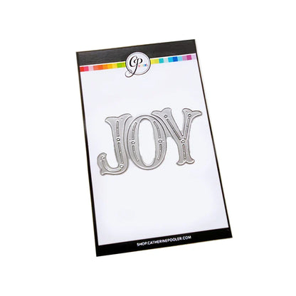Catherine Pooler - Word Die - Festive Joy. Celebrate the season with the Festive Joy Word Die! This beautiful large "JOY" die can serve as the focal point of your holiday cards, adding a bold and cheerful touch. Available at Embellish Away located in Bowmanville Ontario Canada.