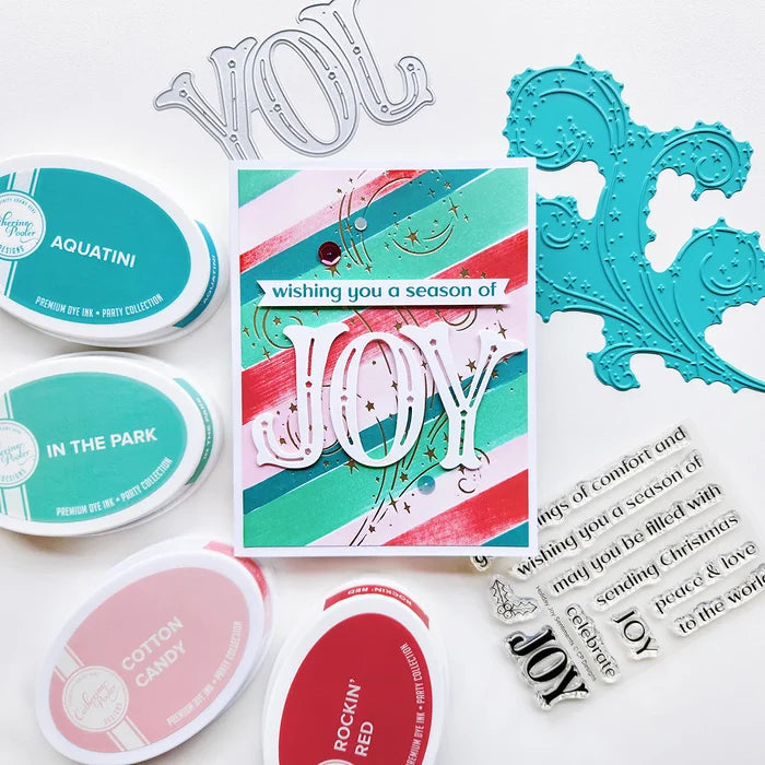 Catherine Pooler - Word Die - Festive Joy. Celebrate the season with the Festive Joy Word Die! This beautiful large "JOY" die can serve as the focal point of your holiday cards, adding a bold and cheerful touch. Available at Embellish Away located in Bowmanville Ontario Canada. Example by Catherine Pooler Designs.