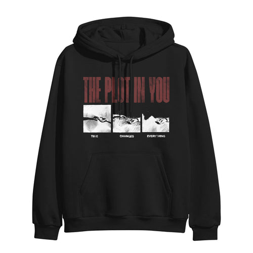 A black The Plot In You hoodie with bold red "THE PLOT IN YOU" text above three black-and-white eye panels, each labeled "TIME," "CHANGES," and "CHANGES EVERYTHING.