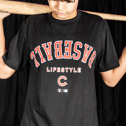 Youth model wearing black youth graphic tee with "Chicago Cubs Upside Down" design