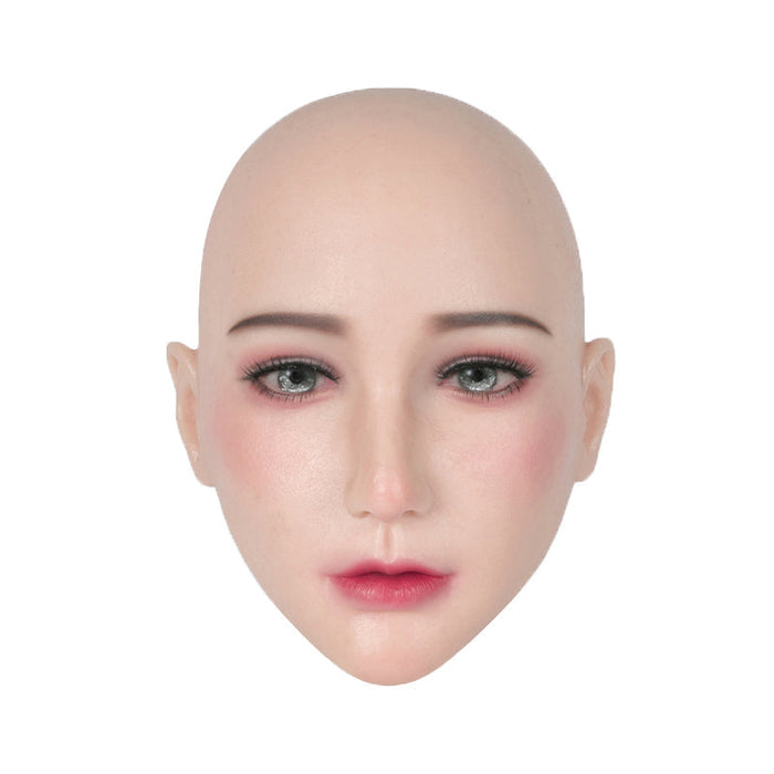 Realistic silicone female makeup mask with lace-back design, detailed fake eyes, and natural makeup look by InTheMask.