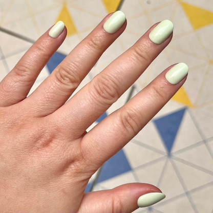 Corrigan | Extra Short | Round - Tab Press-On nails in soft pastel mint green for easy at-home mani and quick application