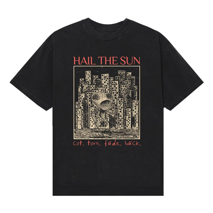 Black Hail The Sun T-shirt with the band’s name bold at the top, a detailed skeletal figure among buildings, and “Cut Turn Fade Back” in striking red at the bottom.