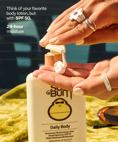 Hands dispensing creamy lotion from Sun Bum Daily 50 Body Lotion bottle with rings on fingers and sunglasses nearby. Think of your favorite body lotion, but with SPF 50.
24-hour moisture