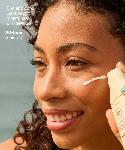 Woman smiling applying Sun Bum Daily 50 Face Lotion with SPF 50 lightweight moisturizer on cheek. One and done.
Lightweight moisturizer with SPF50.
24-hour moisture