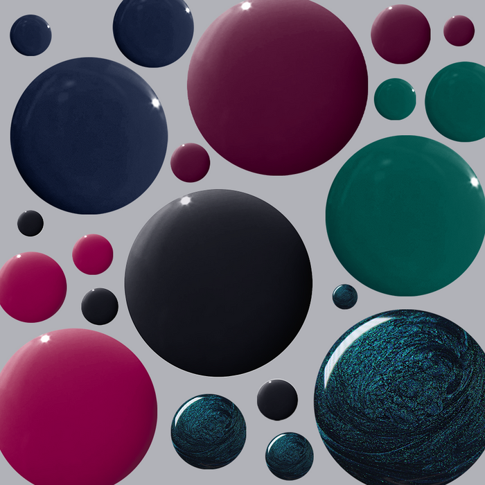 Glossy droplets of deep purple, dark green, navy, maroon, emerald shimmer, and black gel polish from Dark & Moody Gel System