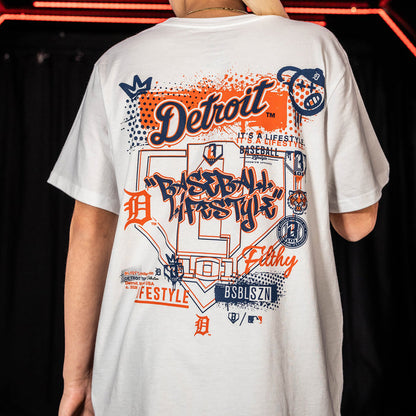 Youth model wearing white youth graphic tee with "Detroit Tigers Drip" design