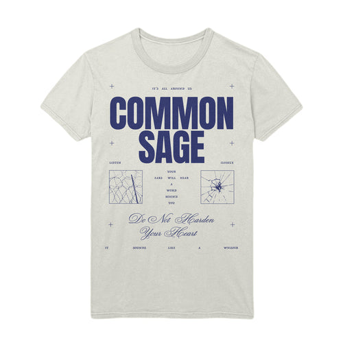 On a white T-shirt the words "Common Sage" are in the center in dark blue. Above these letters are the words "it's all around us" and below "Do Not Harden Your Heart". Tiny blue crosses are around the shirt.