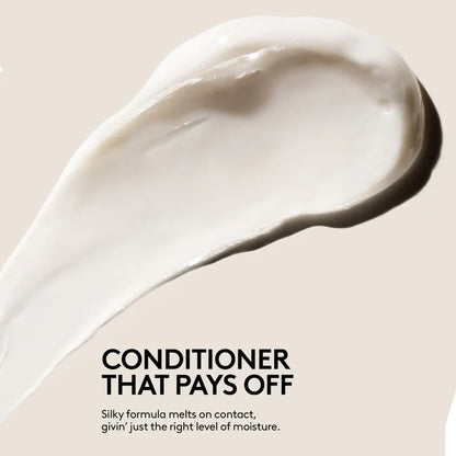 Fenty Beauty The Rich One Moisture Repair Conditioner for fine to medium hair, 10oz, creamy formula in a sleek bottle.