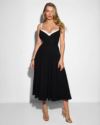 Model wearing Fit & Flare Midi Dress - Black/White front view