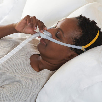 Woman Sleeping While Wearing Solo CPAP Mask