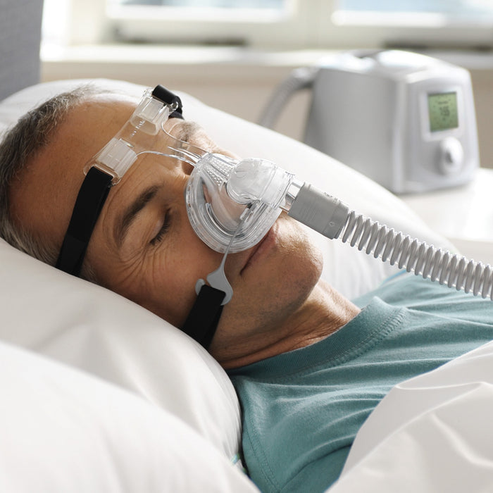 Man In Bed using a Zest Q Mask
