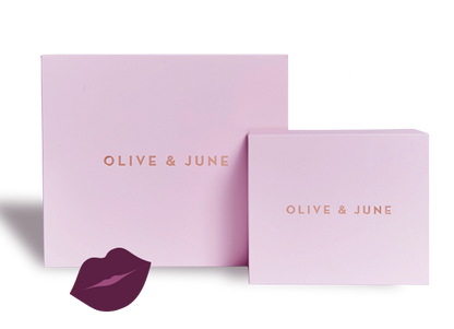 Gift Box with Olive and June branding in soft pink packaging for an at home manicure and pedicure set