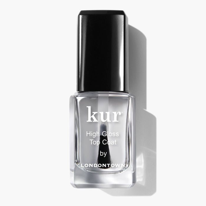 A clear glass bottle of LONDONTOWN High Gloss Top Coat with a black cap displays its brilliant shine, photographed against a white background.