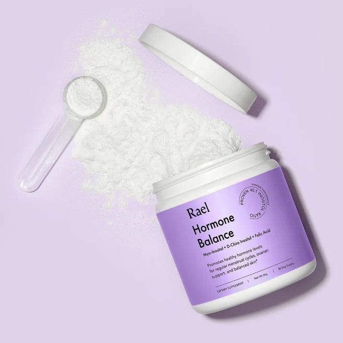 Hormone Balance Supplement flat lay with powered formula and scoop